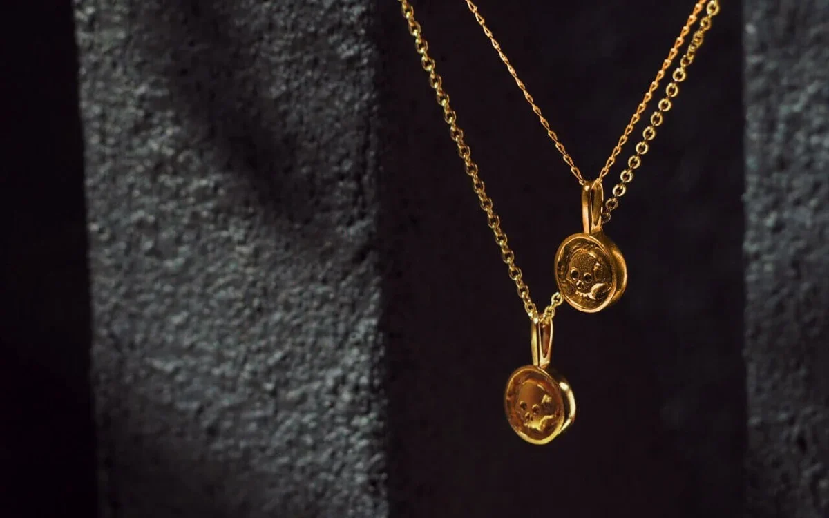 Gold-Vermeil-Clairval-skull-medallion-necklace-from-side-SLAB-Jewellery.webp