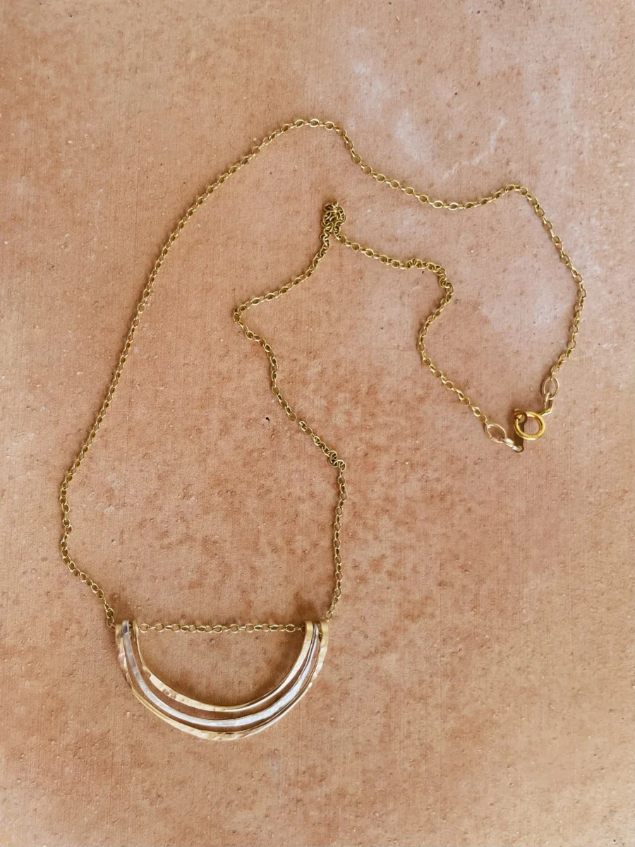 RoseandyellowgoldparthammeredloopnecklacefromaboveLindsayMcDonagh.webp