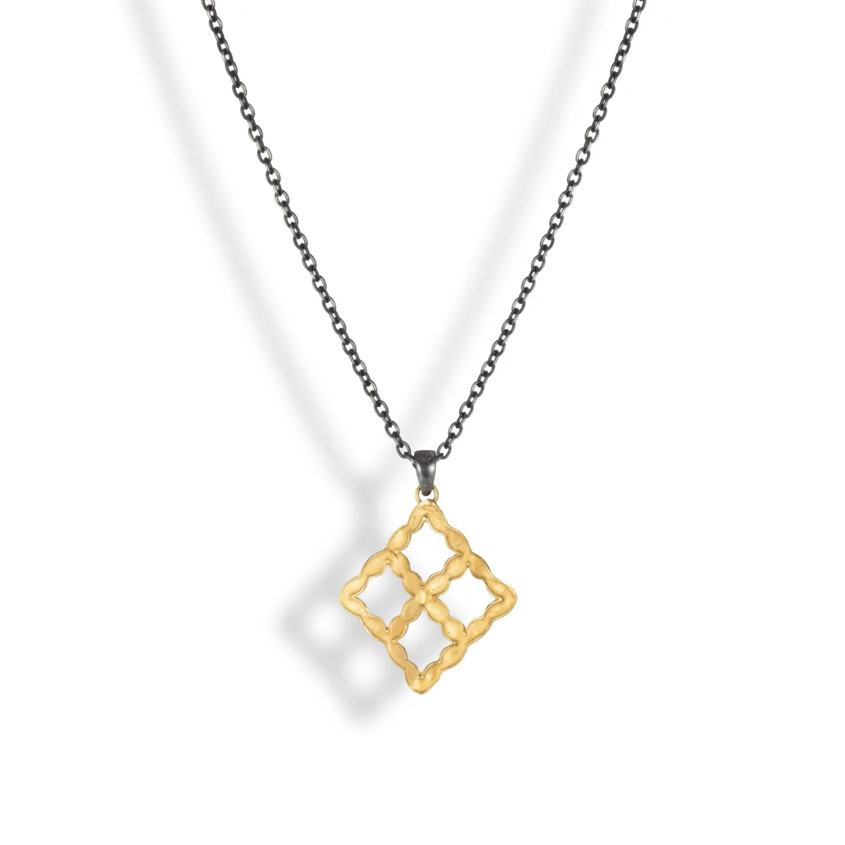 ShiraniFernando-LightandShadowssmallnecklacewithblackchain.webp