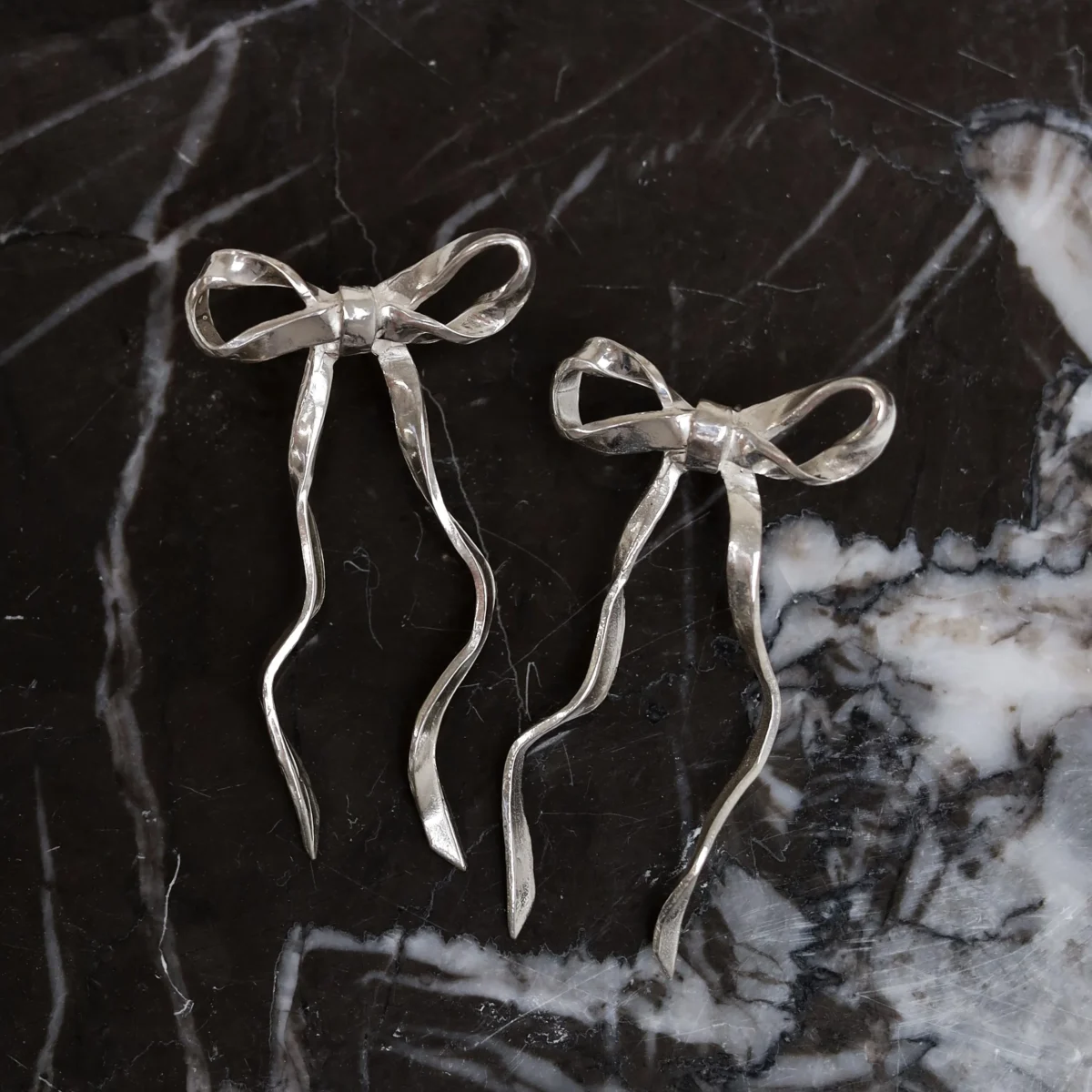 Silver26Steel-EvieSpicer-Ribbonearrings2.webp