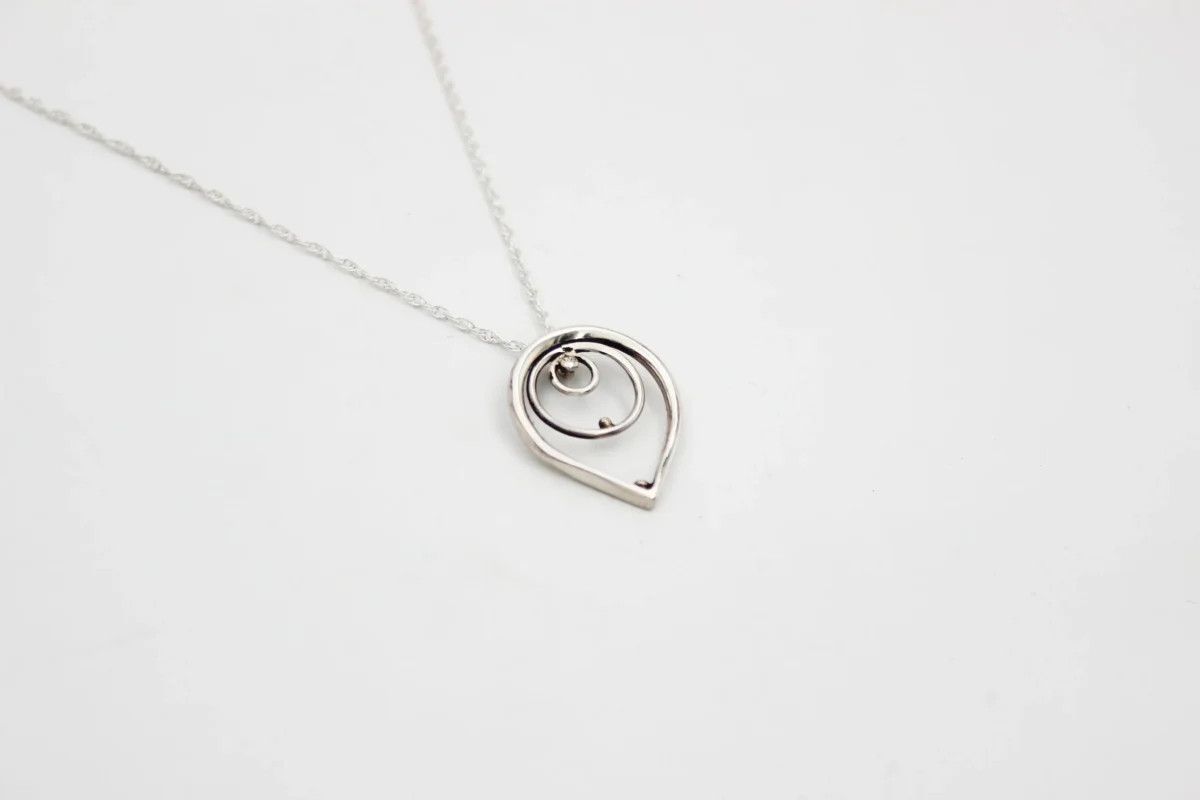 SilverDuckMandalaLineTearNecklace.webp