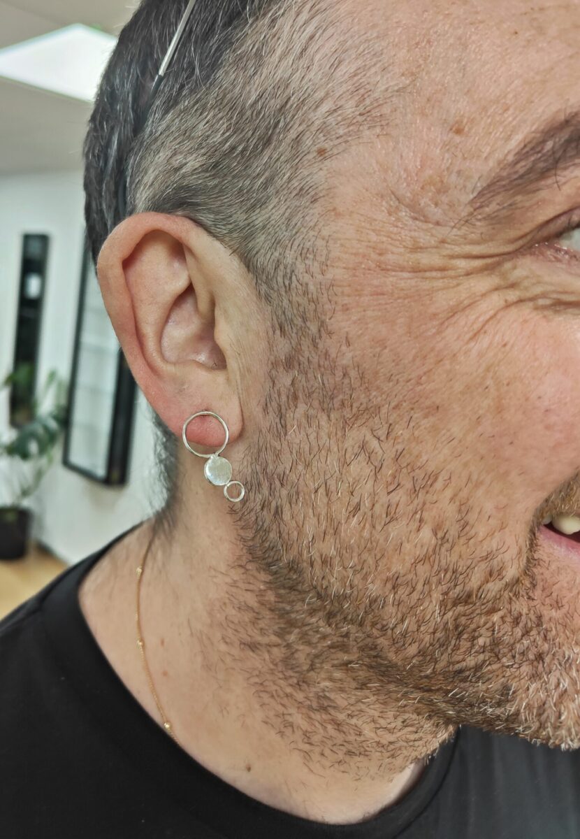 abstract stud earring made of three circles joined together