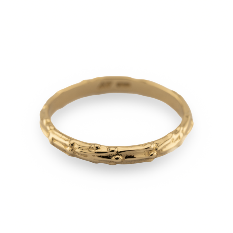 a kelp inspired ring in solid gold
